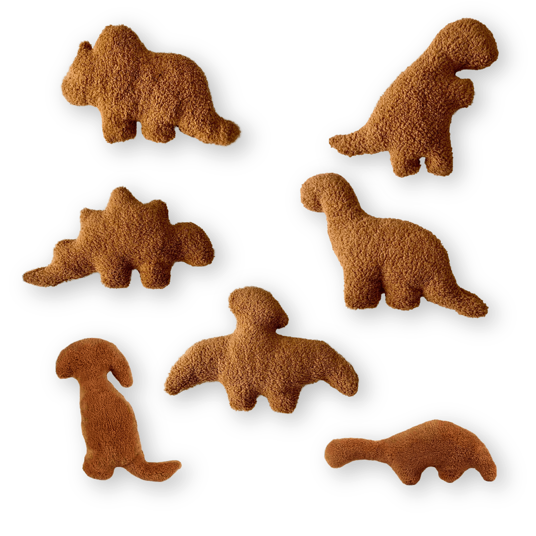 Peluches Dino Nuggets - Orbital ClothingPeluches Dino NuggetsCojín decorativoMarrón